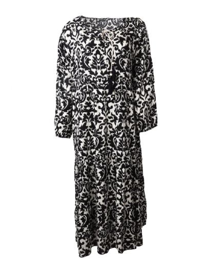Lange jurk met zwarte ornament print en kwastjes