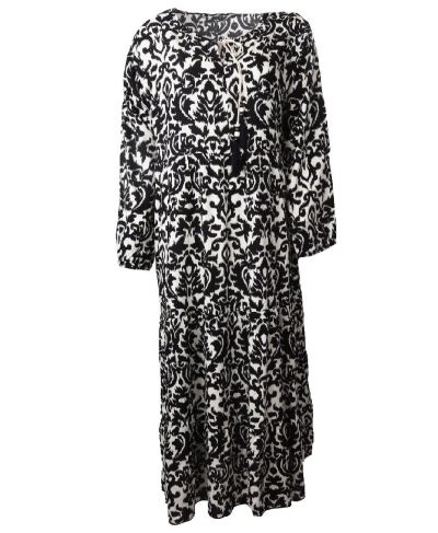 Lange jurk met zwarte ornament print en kwastjes