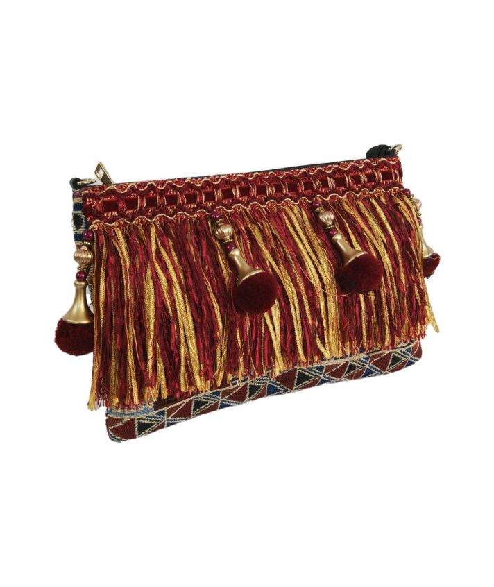 Gobelin clutch afgewerkt met fluweelband, franjes en pompoenen