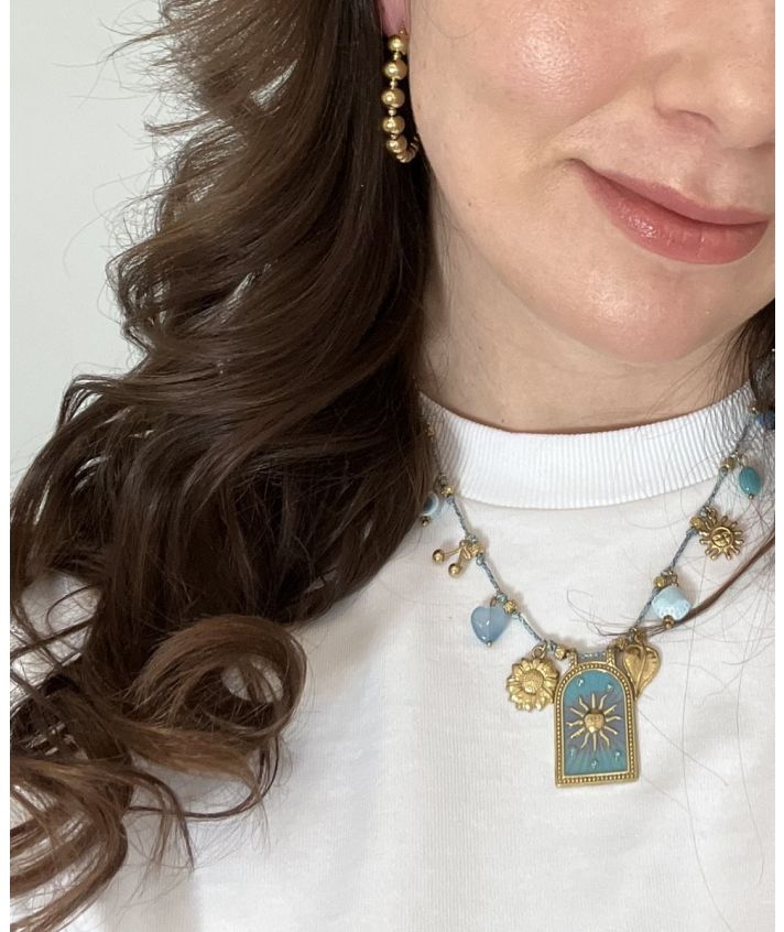 Gevlochten touwketting in turquoise met bedels