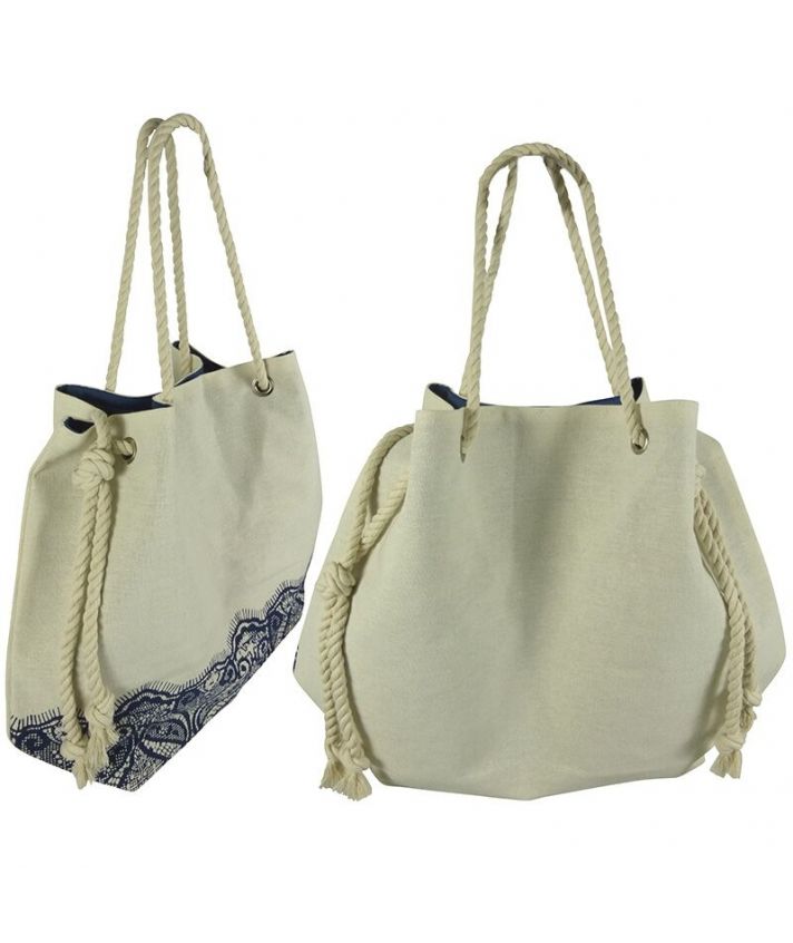 Ivoorkleurige strandtas met borduursel print