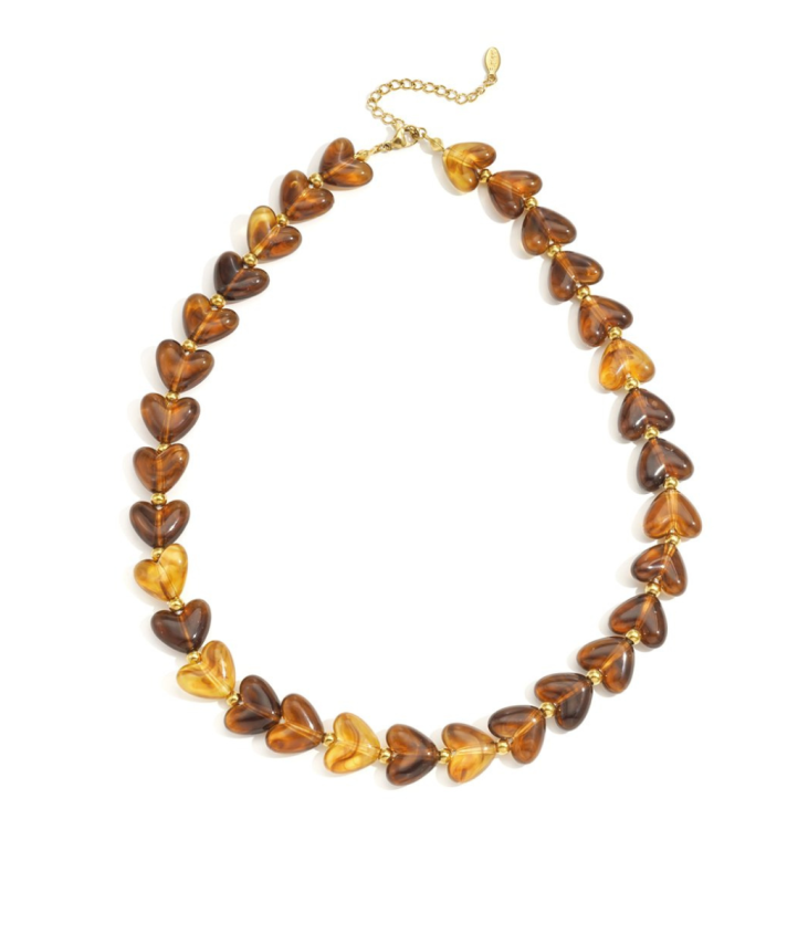 Hartjes kralenketting met marmer effect in bruin