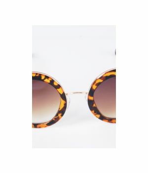 Trendy zonnebril met ronde luipaardprint frame